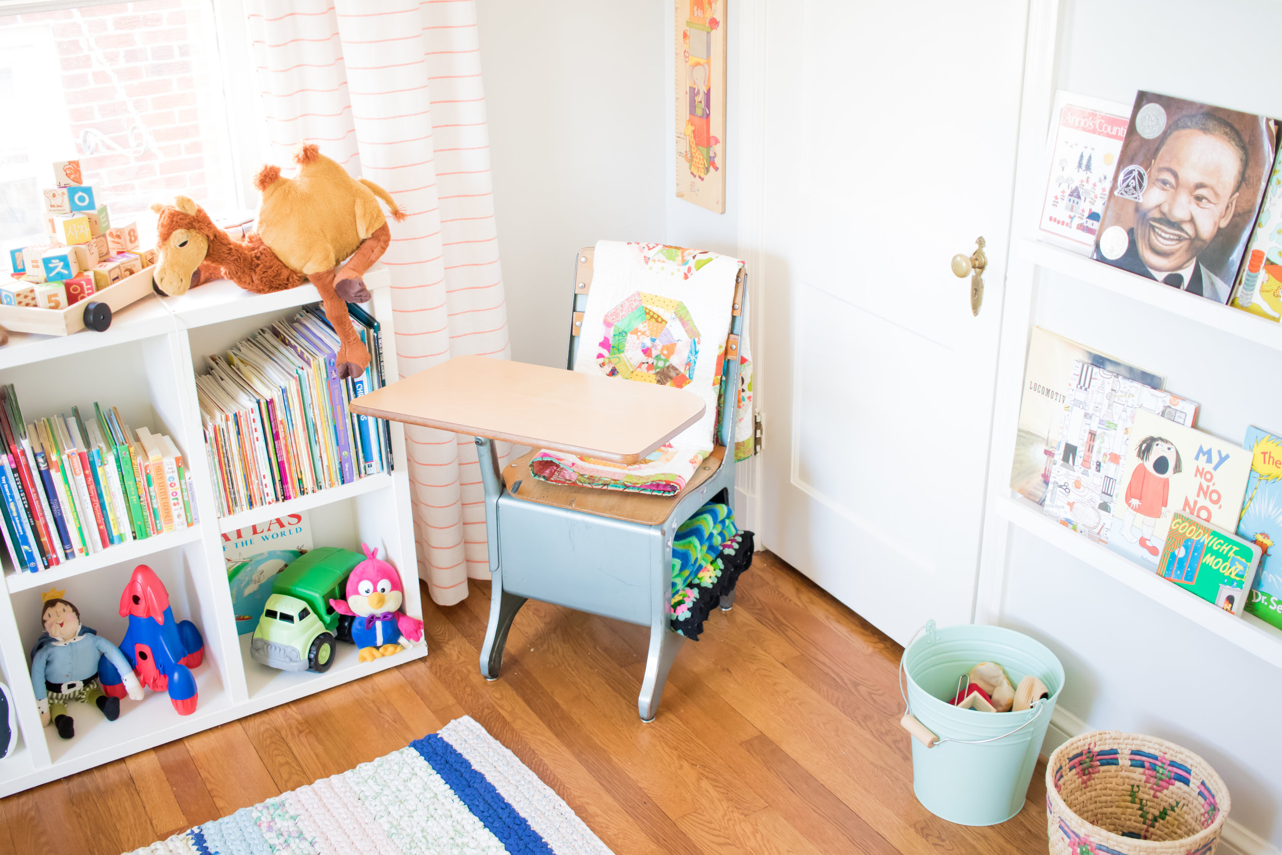  We have three of these old school desks. Bella's baby quilt still looks pretty good! 