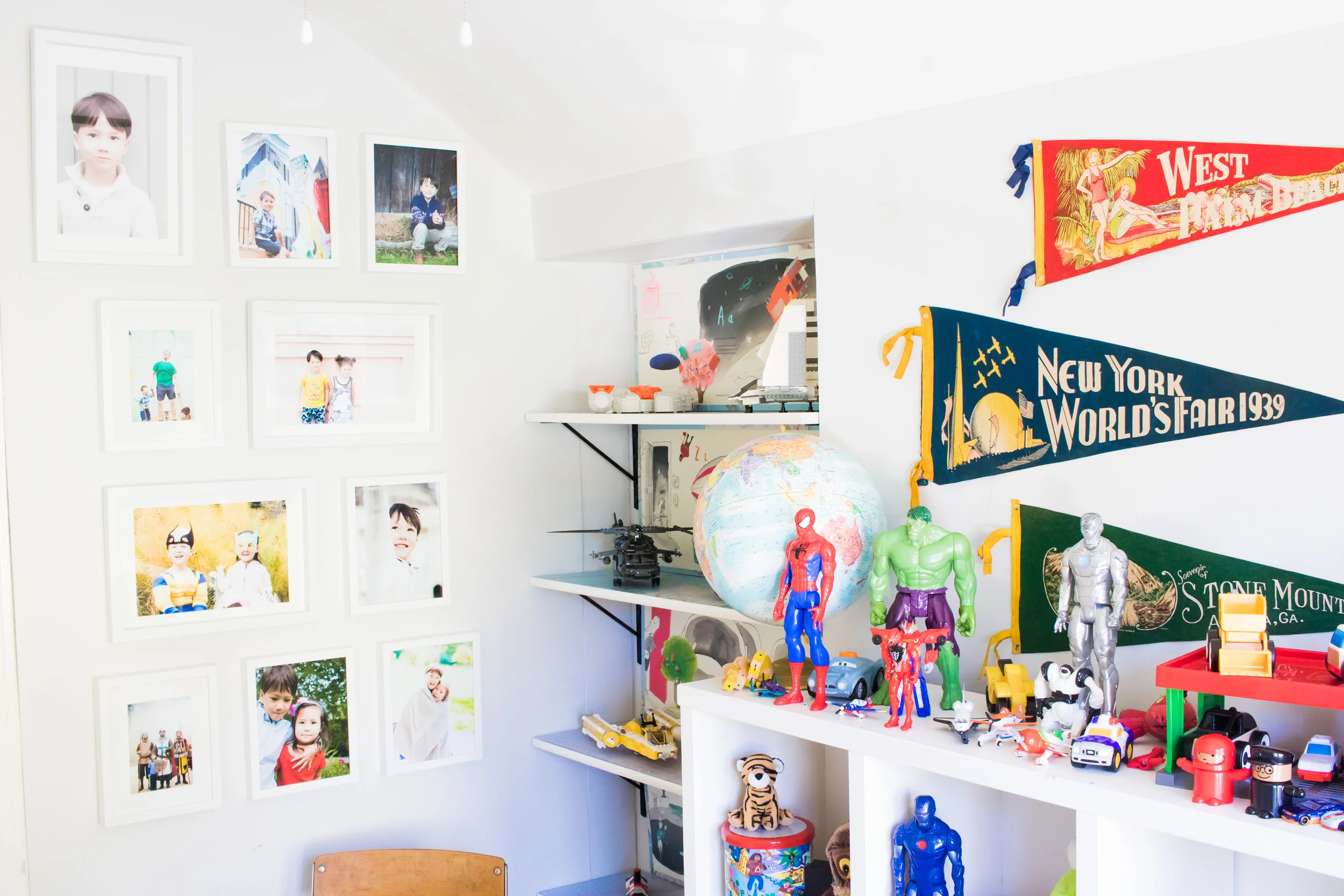 Next to the big bookshelf is a little alcove where we put in a set of shelves where Nuelie could play with and store his Legos. I did a whole post about how we made that - check it out here .