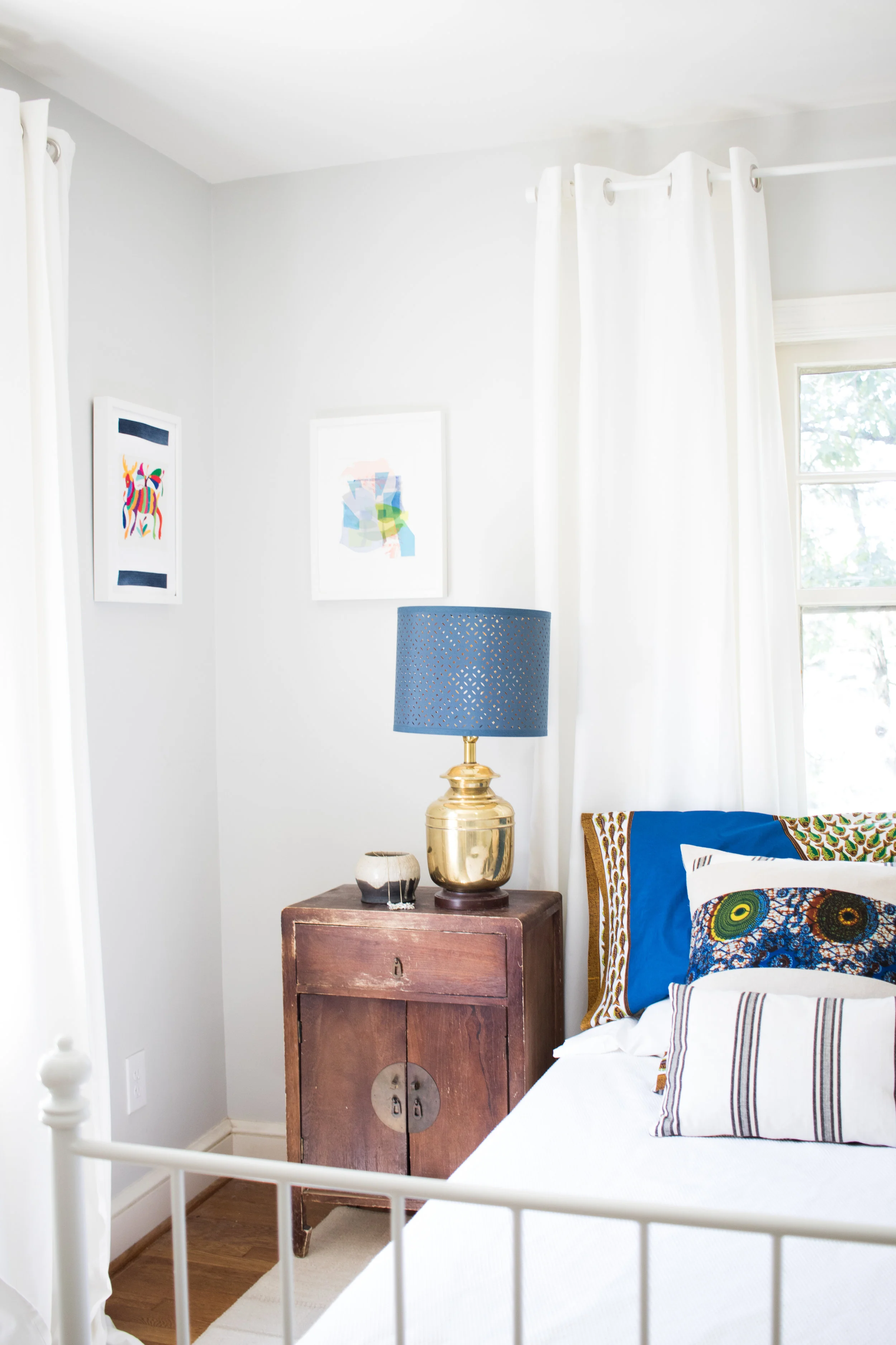 The night stands are from Korea. It's not an antique, but it looks like it from our use! 