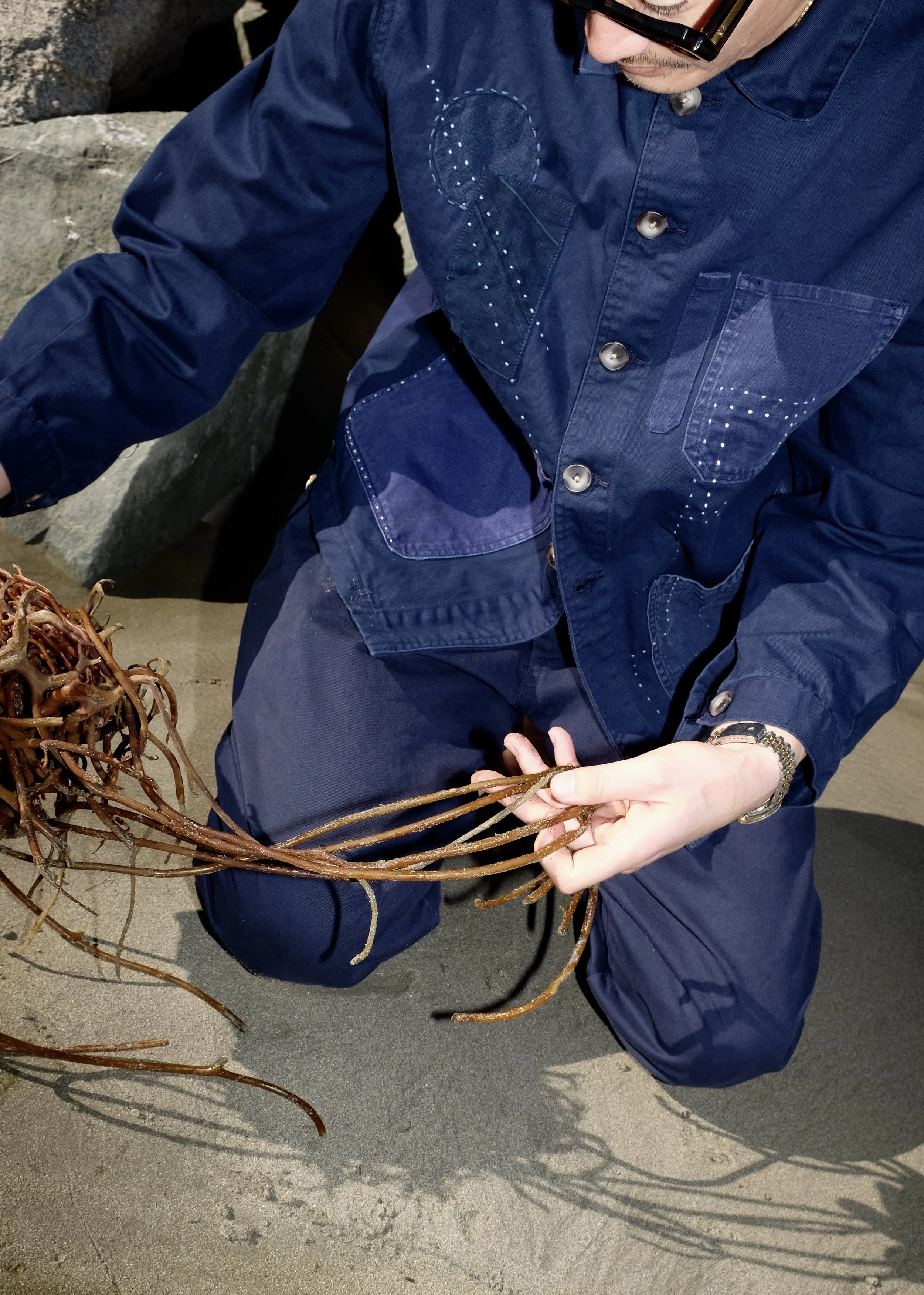 Details of the Jason White Sack Coat uniform collaboration designed by Finery.