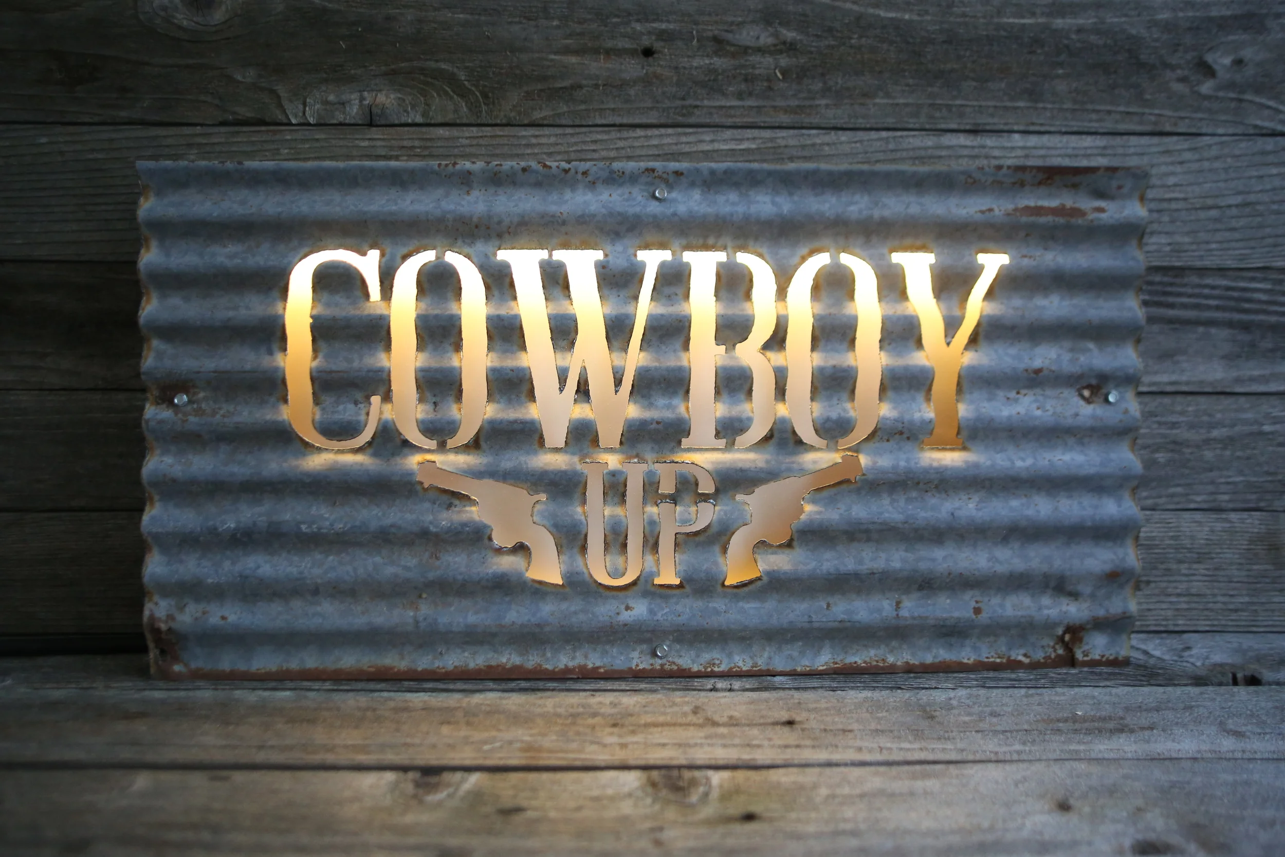 Cowboy Up Lit.JPG