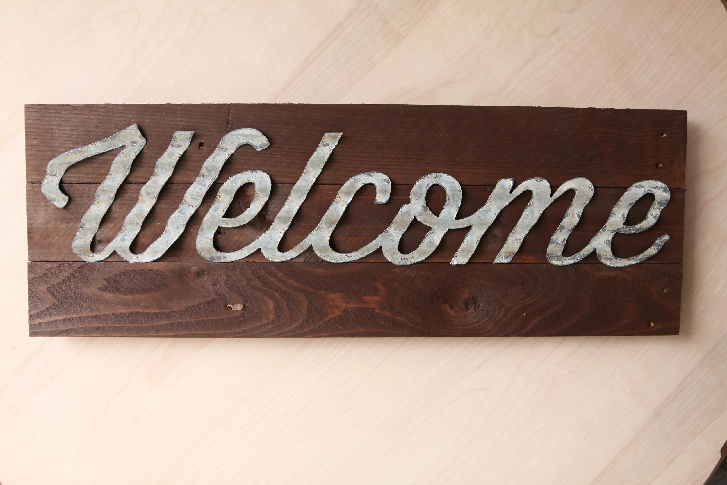 CursiveWelcomeStain.JPG