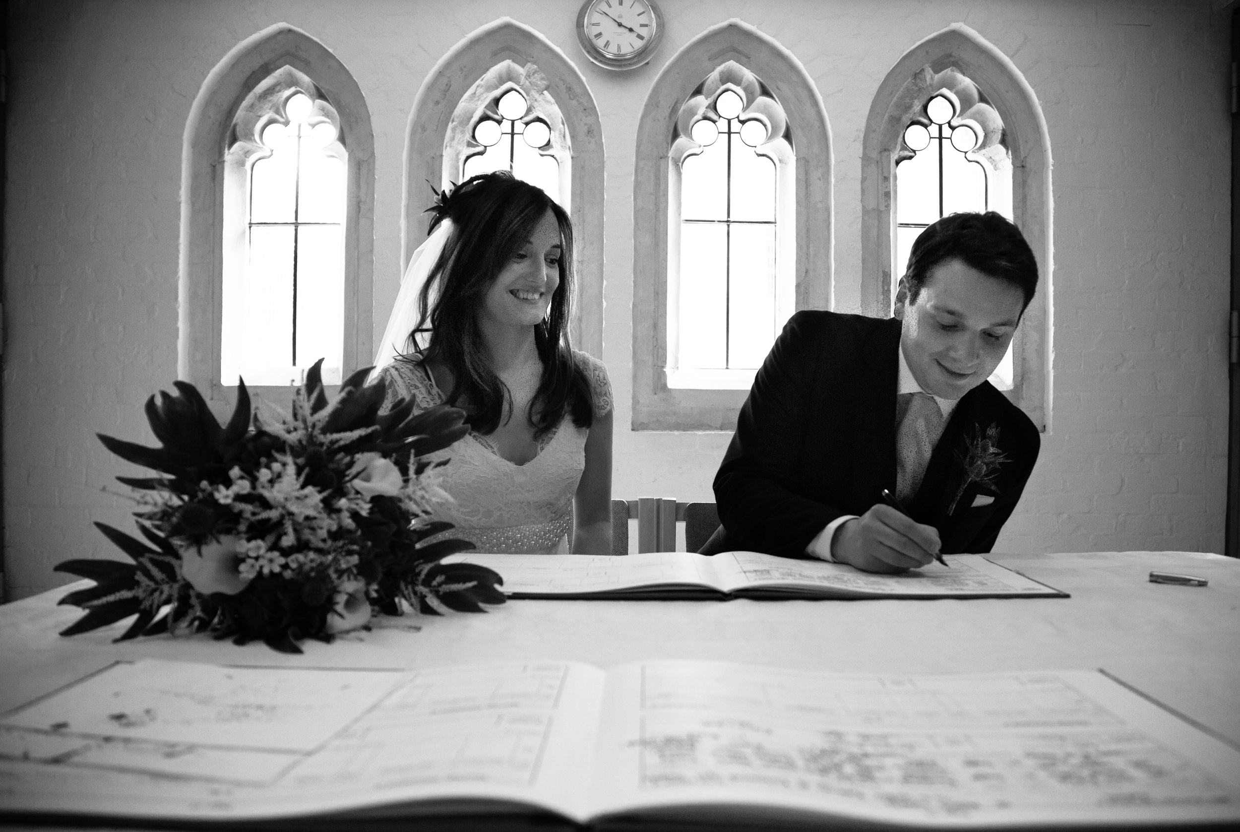 st-mary's-church-barnes-signing-register-london-uk-destination-wedding-photography-Adam-Rowley