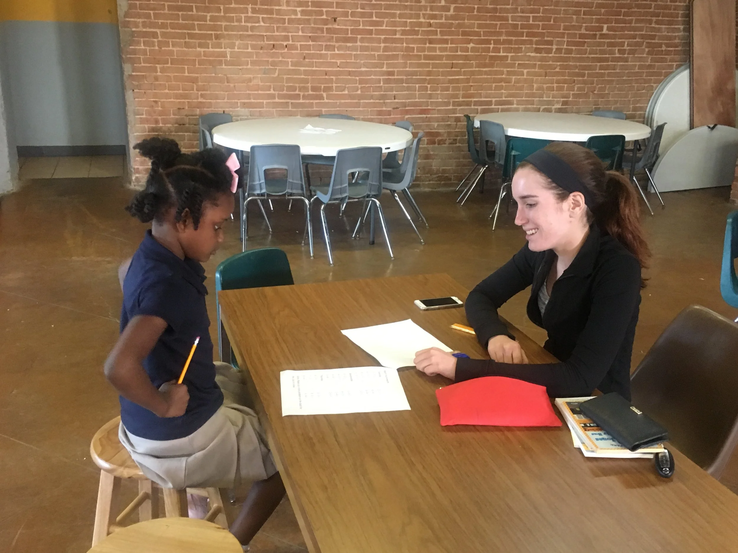 Z’Ariyah and her mentor work on a homework assignment.