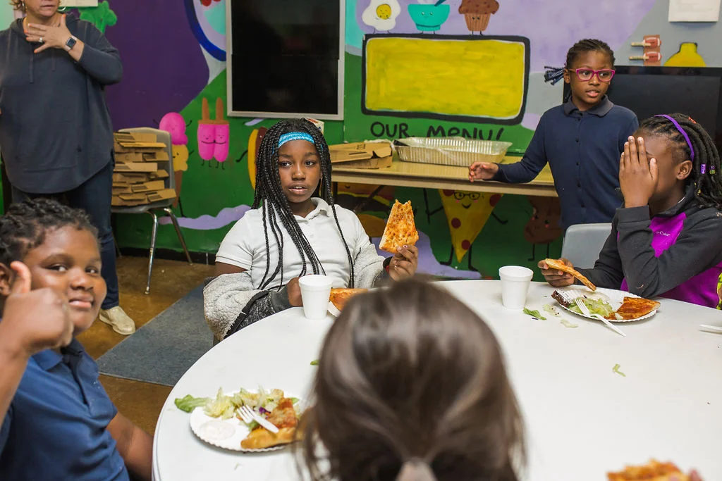 Students in After School enjoy snack and dinner, homework help, and extracurricular activities.