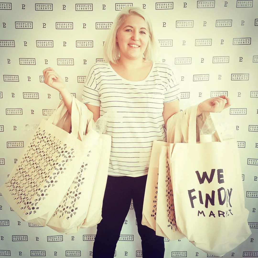 Handing out swag bags to our neighbor merchants at Findlay Market.