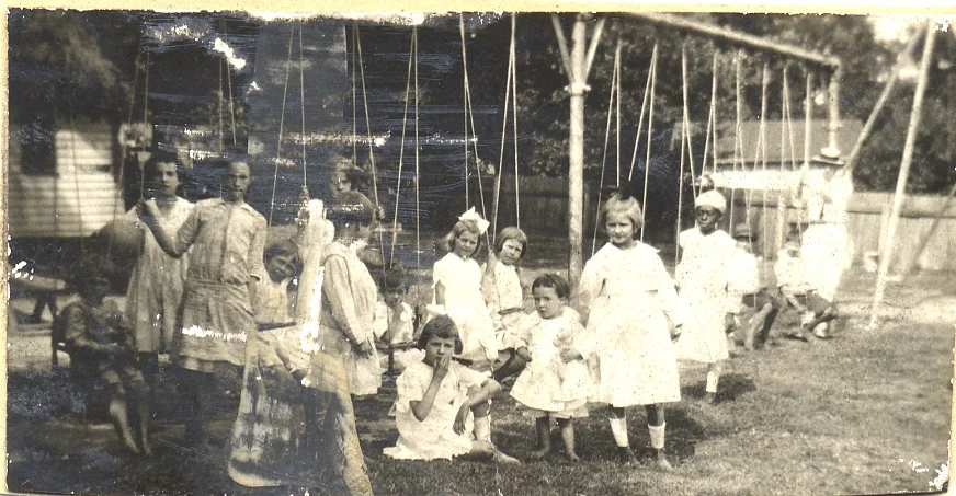 Children swinging at Guggenheimer-Milliken in 1914, the year it opened.
