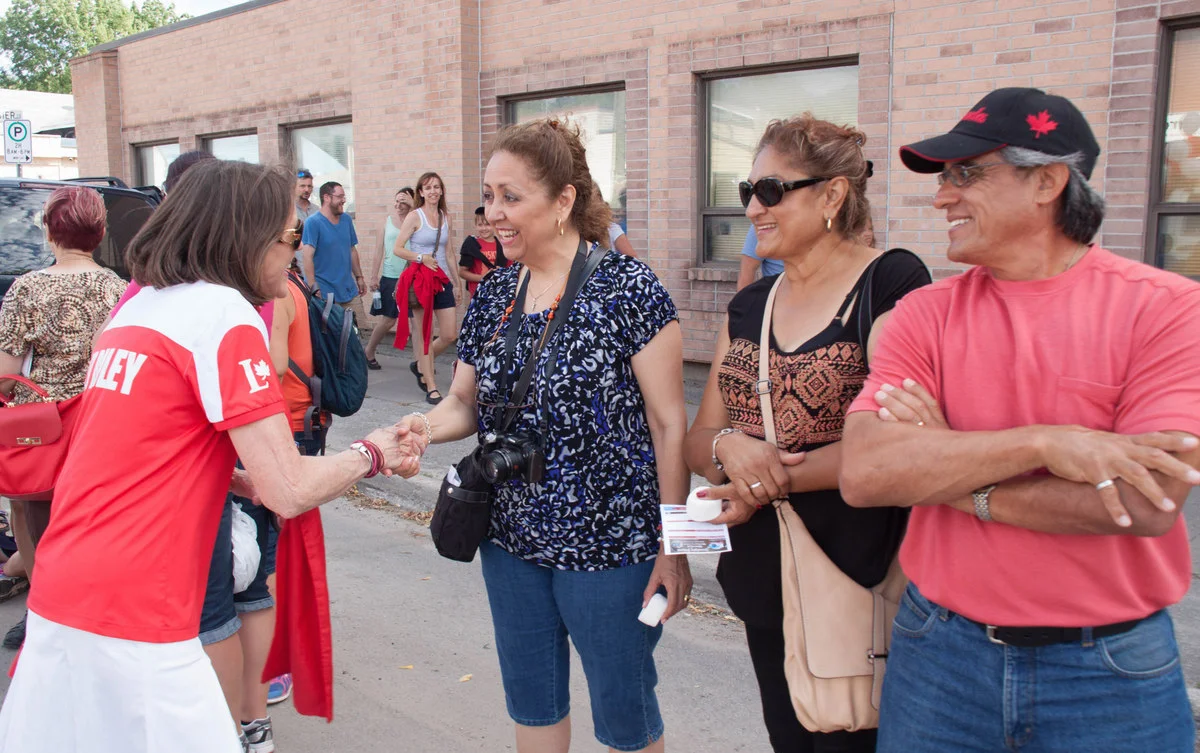 Liz Riley greets voters on the campaign trail. PHOTO: COURTESY OF TERRY MACPHERSON