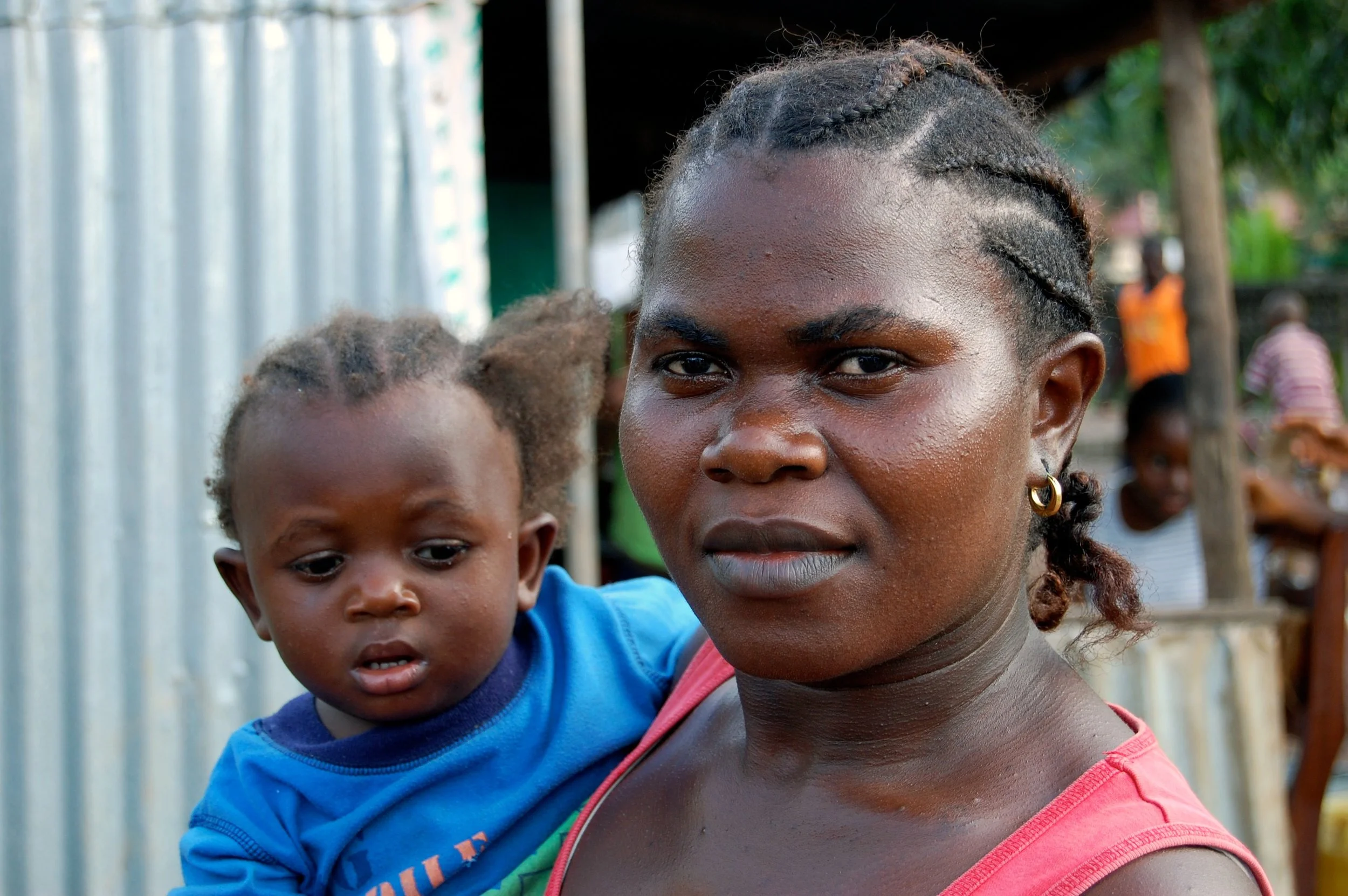A mother and child on election day in Lumley, Freetown