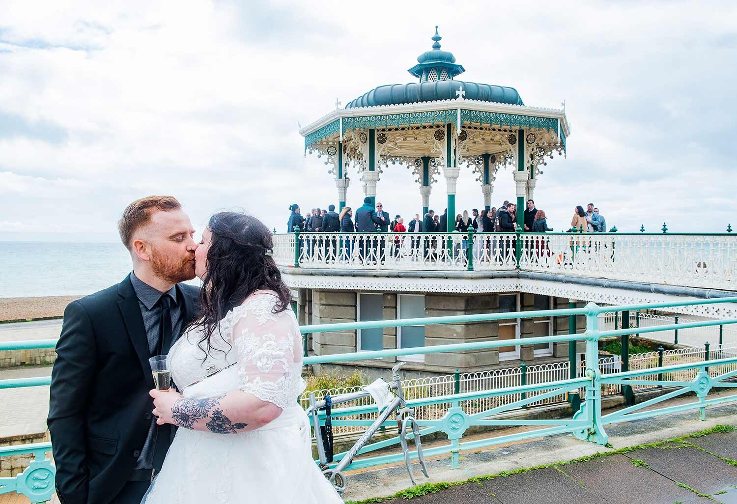 Groom and bride wedding photography brighton bandstand
