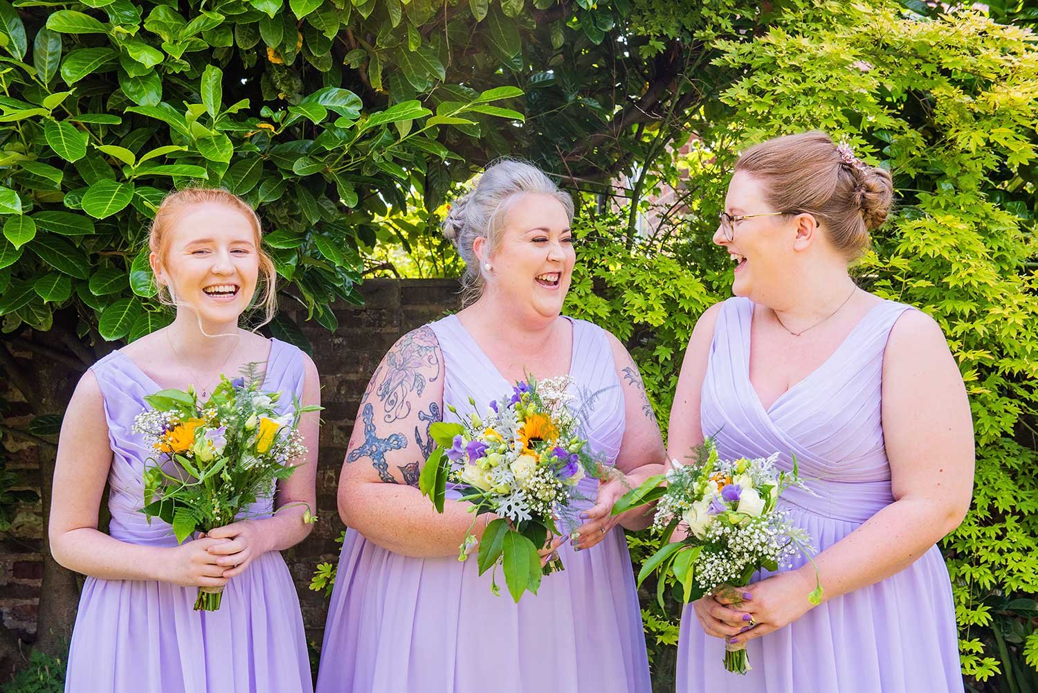 Sussex Bridesmaids with flowers
