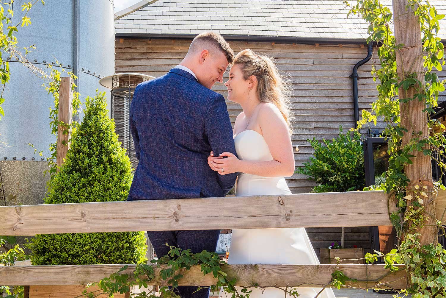 Southlands Barn wedding couple in embrace