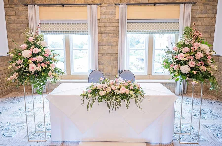 Ceremony venue at South Lodge, Horsham decorated for the couple’s special day.