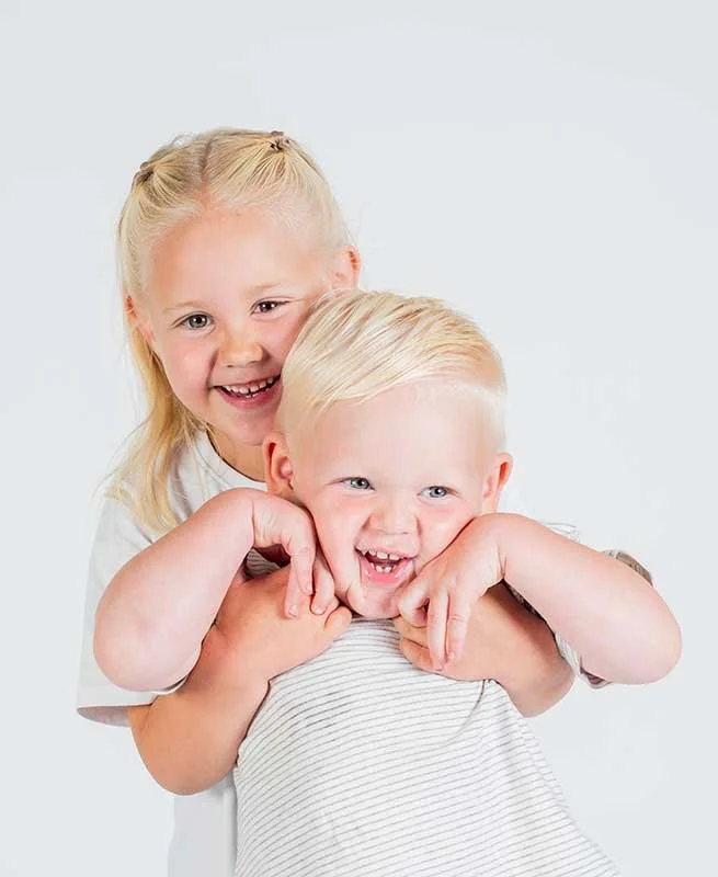 two kids sharing portrait photo in littlehampton studio