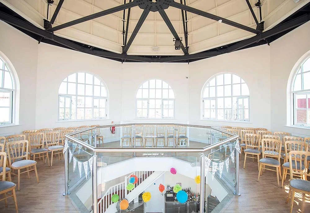 Wedding photos inside Worthing Dome with elegant architecture.