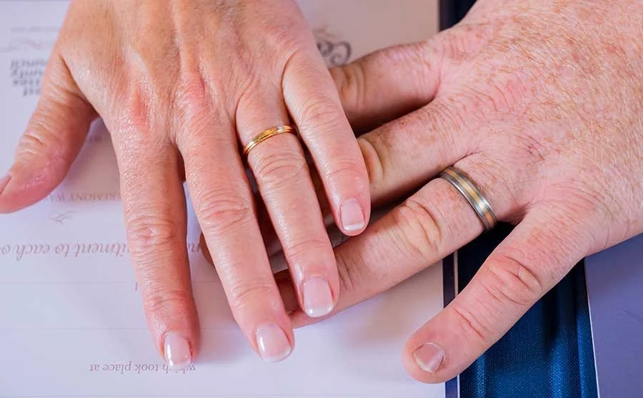 Wedding rings photographed with elegant details from an Arundel Town Hall wedding day