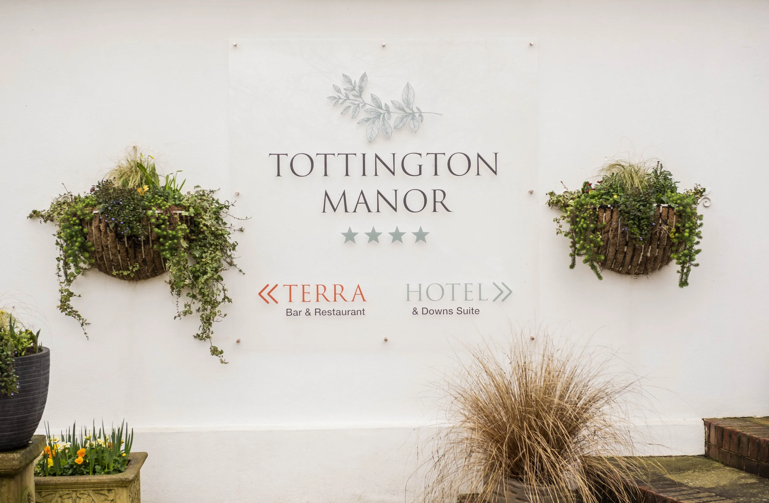 Outside signage at Tollington Manor