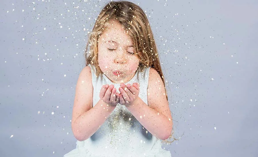 Littlehampton studio child glitter mini session portrait, young child in studio with sparkling glitter backdrop, fine art children photography West Sussex