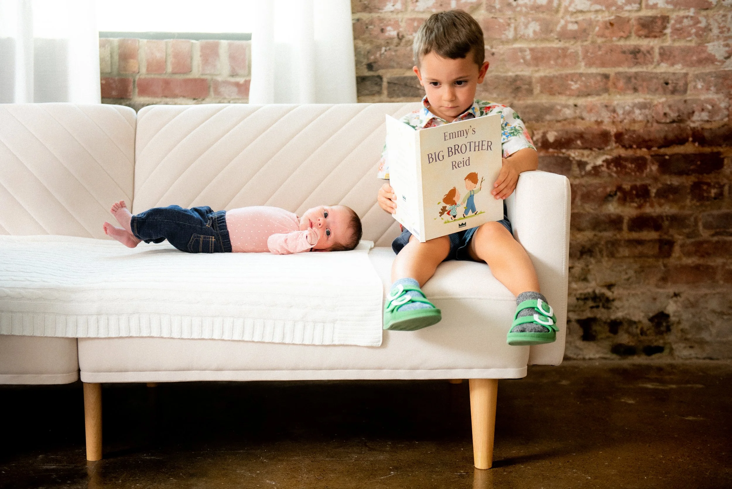 Studio family photography Gibsonville NC — siblings on white sofa, Alison Tapp Photography