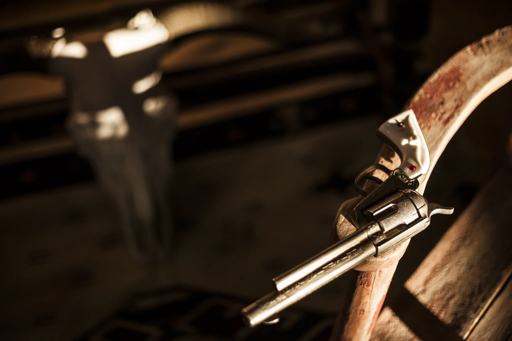 Antique Revolver on a Primitive Rocking Chair