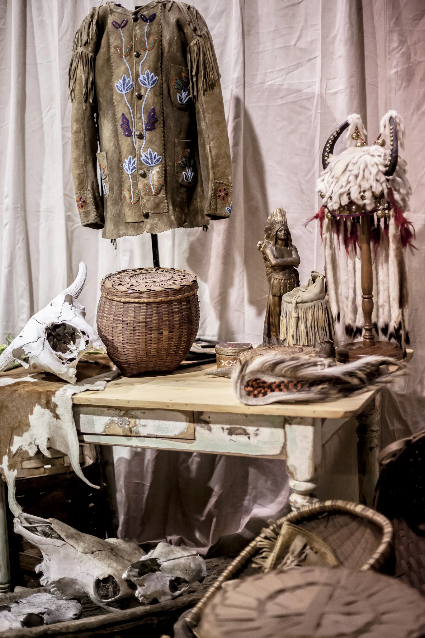 Primitive Beaded Jacket, Indian Headdress, Handwoven Basket, Carved Native American Statue and More