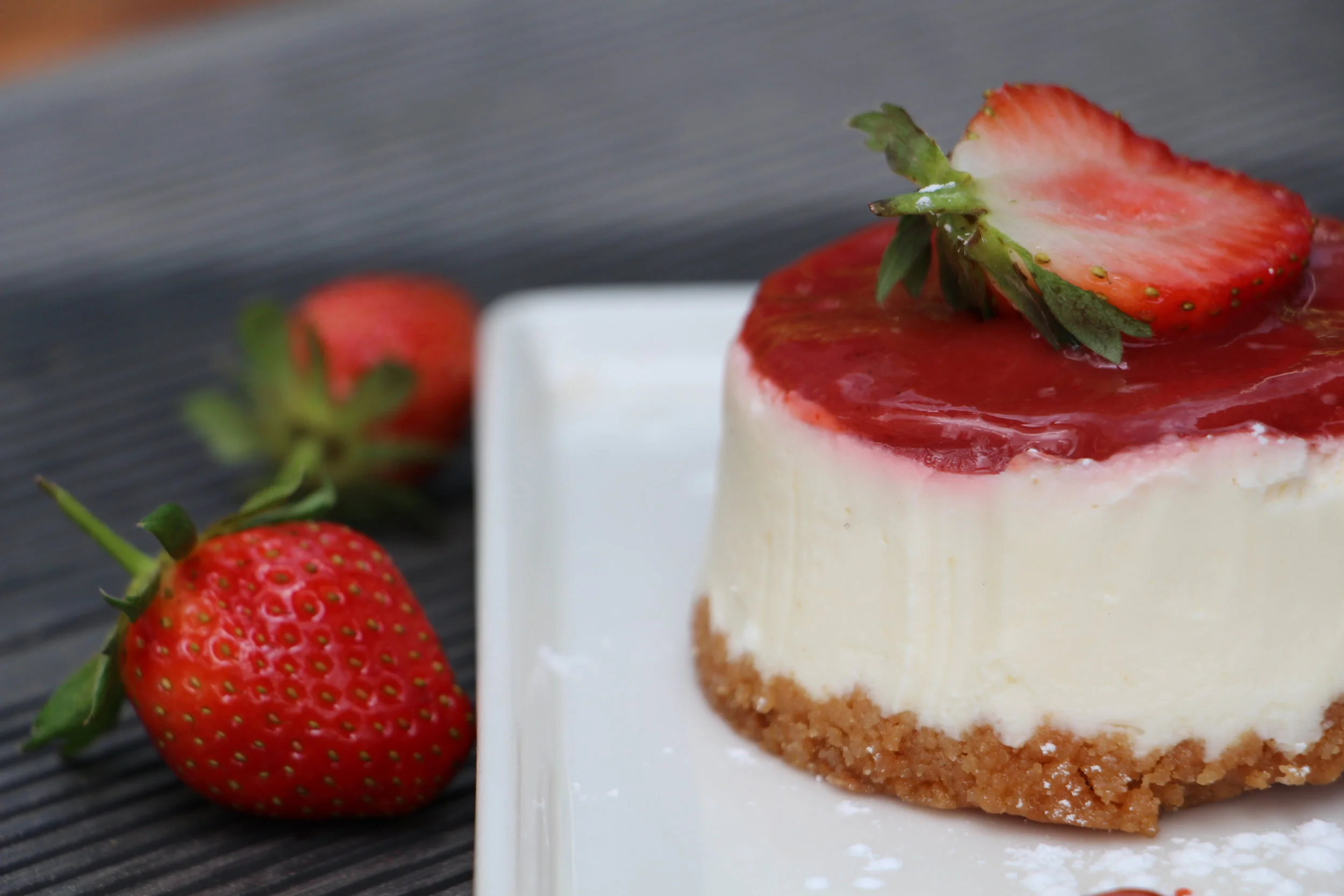 Soft cheesecake coupled with fresh strawberries will leave you fighting with bae for the last bite.