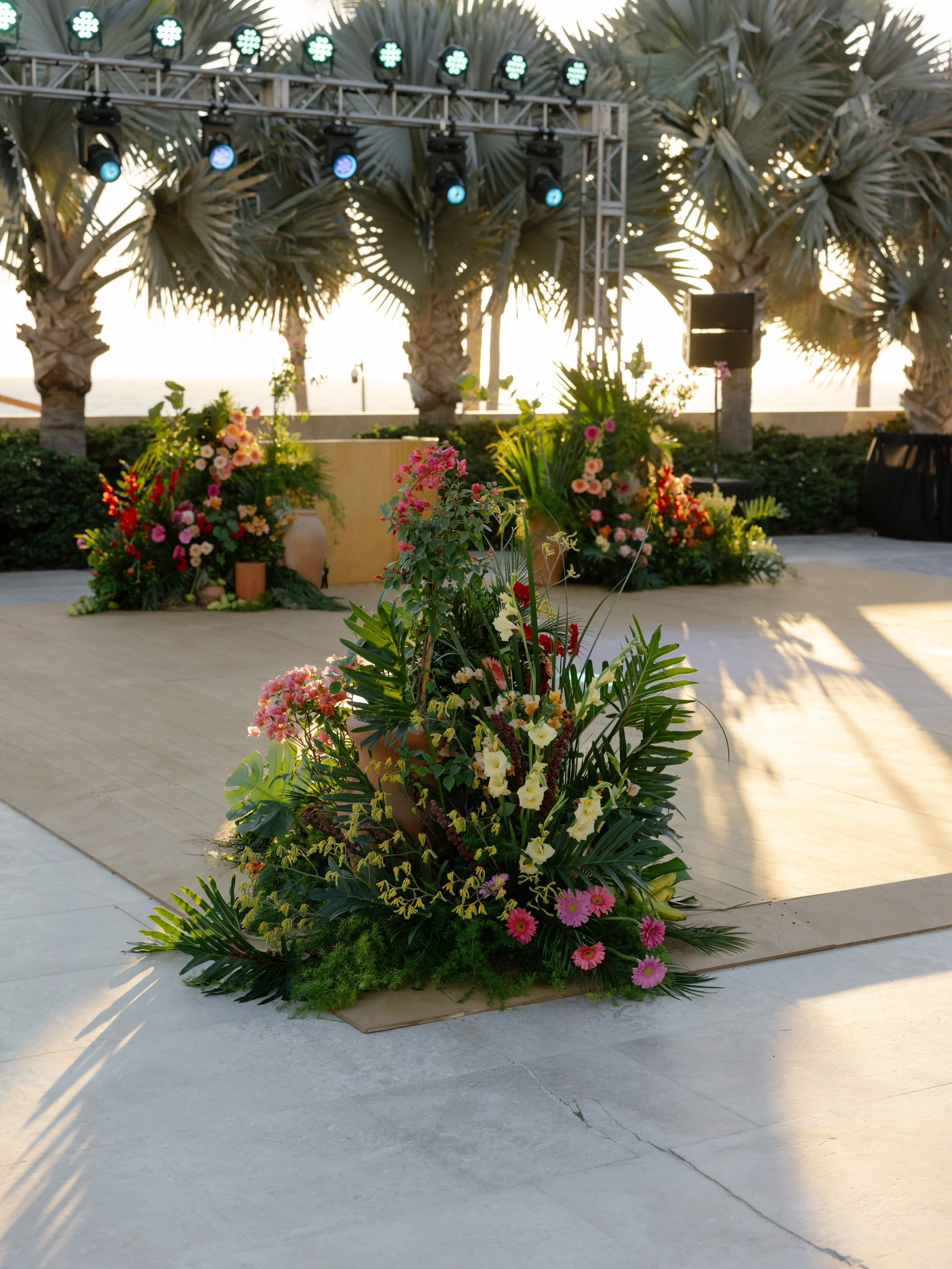 Make your Sangeet dance floor the most photographed moment of the night. Floral installations framing your dance floor transform the entire energy of the room. 

Photographer @emily.magers 
Planner @wealhouse.co 
Venue @nobuloscabos