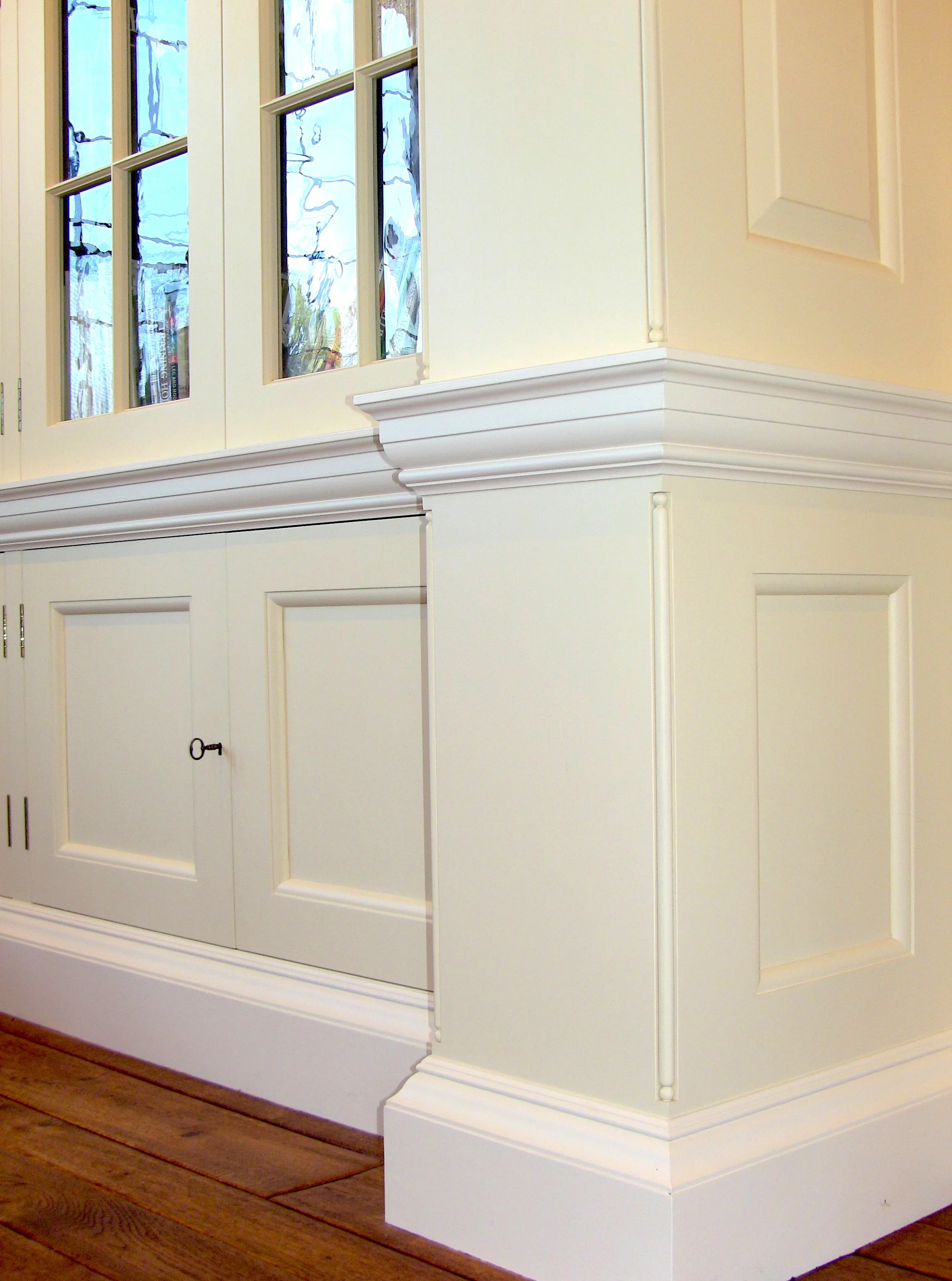 Notice the beautiful texture of the hand blown glass.&nbsp;All the cabinet doors are accessed via keyed antique-style half-mortise furniture locks.&nbsp;The floor to ceiling paneling in the Drawing Room, Library and Music Room is an exact reproducti…