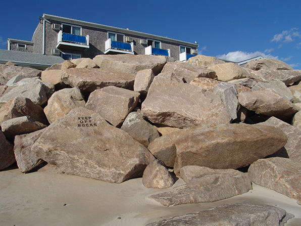 Rates of beach erosion along the Westerly shoreline are increasing, prompting the need to relocate some buildings, even those ‘protected’ by a wall of boulders. (Frank Carini/ecoRI News)
