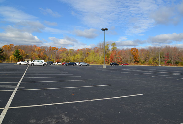 Twin River Casino in Lincoln has some 12 acres of parking, which included paving over more than 2 acres of a field at the edge of a wetland without town or state consent. (Joanna Detz/ecoRI News)