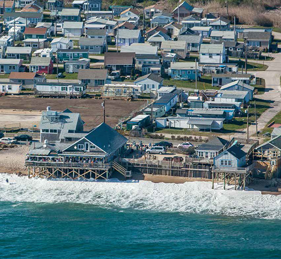 Ocean Mist, the waterfront bar in Matunuck, and many of the buildings along the popular beach are losing land to a rising sea. (©John Supancic/for R.I. Sea Grant)