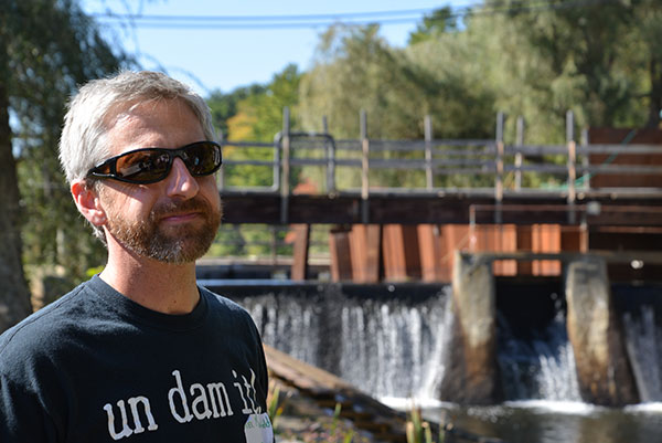 'There’s this misconception that dams protect properties downstream from flooding,' says Alex Mansfield of the Jones River Watershed Association. 'Removing dams helps prevent upstream and downstream flooding.' (Joanna Detz/ecoRI News photos)