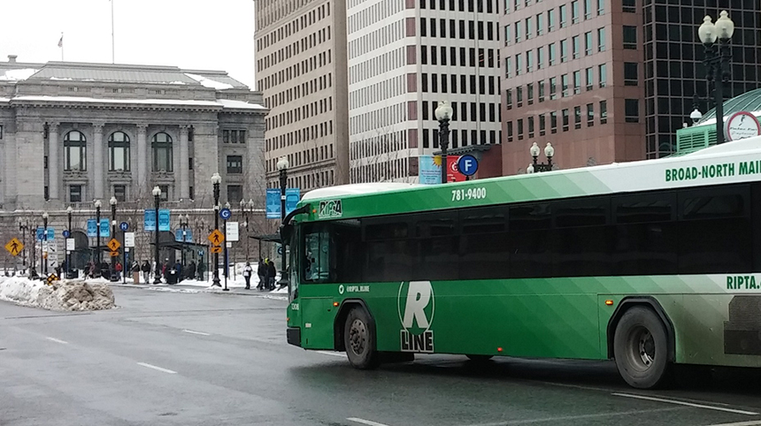 A rebranded R-Line bus enters the recently renovated Kennedy Plaza. New shelters in the downtown Providence plaza offer real-time bus information to waiting passengers. (Kevin Proft/ecoRI News photos)