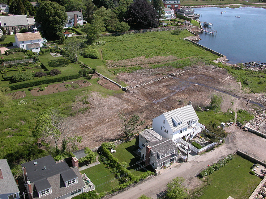 An aerial view of the Avalonia Land Conservancy’s Dodge Paddock and Beal Preserve in the Borough of Stonington, Conn. The brown area is where phragmites, an invasive plant, were removed. A drainage ditch has been dug in an effort to dry the nearly 3 acres, on Stonington Harbor. The next step is replanting the area with fresh and saltwater tolerant plants. (Roger Wolfe/DEEP)