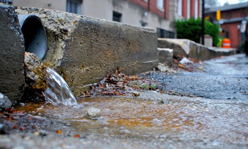 Impervious surfaces rush polluted water into important natural resources such as rivers and bays. (Chesapeake Bay Program)