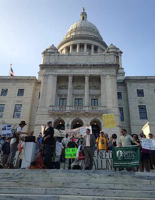 A recent rally at the Statehouse stressed the importance of environmental and social justice. (Abbey Greene/ecoRI News)