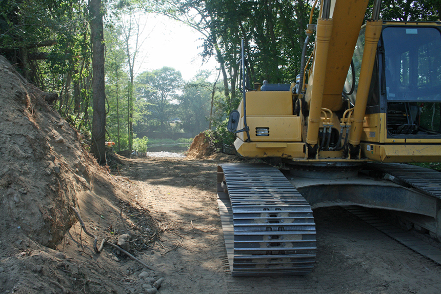 A view down the road carved through the woods from Cherenzia Excavation Inc. on the Rhode Island side of the Pawcatuck River. Building the road was the project’s first step. (David Smith/ecoRI News photos)