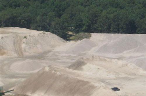 An aerial photo of the dust piles that can be found at Copar Quarries in Westerly, R.I. There are some 40,000 tons of stone dust on the property. (Steve Dubios)