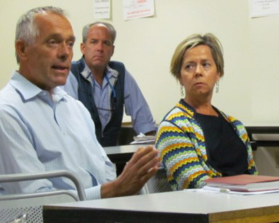 Chris Van Beek, left, president of Deepwater Wind, said the company stands behind the flawless test results for the project’s welds. To the right, is Robin Main, an attorney for Deepwater Wind. (Tim Faulkner/ecoRI News)