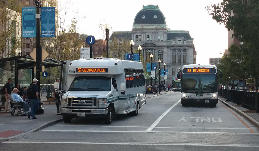 Low-income seniors and people with disabilities currently ride RIPTA buses for free, but the authority is considering charging them half the price of the base fare — a dollar per ride. Many who live on limited and fixed incomes are unhappy with the proposed increase. (Kevin Proft/ecoRI News)