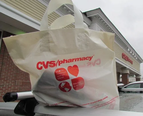 CVS is calling these thicker plastic bags with handles ‘reusable' as a way of getting around the law. (Tim Faulkner/ecoRI News)