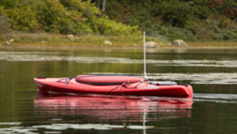 The use of an unmanned kayak is aiding in the study of fish consumption and public health. (Nora Lewis/URI)