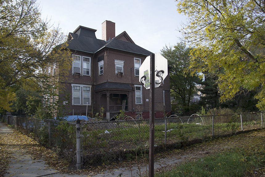 A Providence restaurant owner would like to see this vacant building at the corner of Almy and Meader streets turned into a vertical farm. An urban farmer is already growing food outside the former Head Start school. (Joanna Detz/ecoRI News)