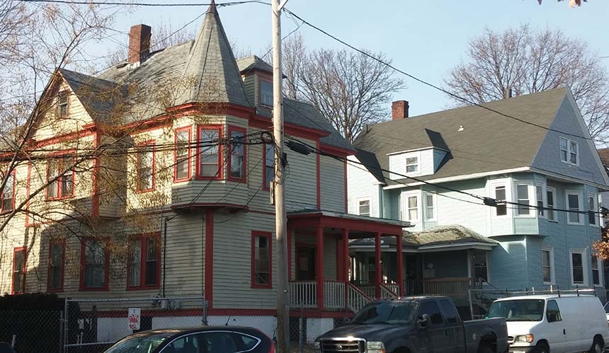 Two of the seven homes Brown University would like to raze. The homes were neglected by a previous owner and are beyond rehabilitation, according to the university. (Kevin Proft/ecoRI News)