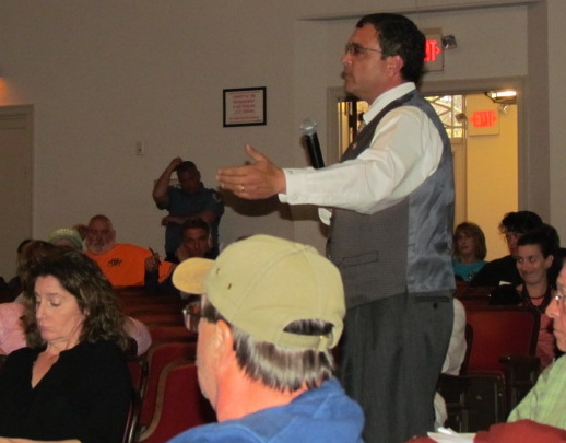 Burrillville Town Council president John F. Pacheco III says he wants Gov. Gina Raimondo to make good on her promise to meet with local residents. Pacheco made the comment during a May 18 town meeting. (Tim Faulkner/ecoRI News photos)