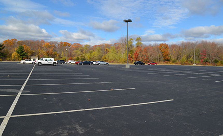 Nearly 30 percent, and growing, of Rhode Island’s land total has been developed and covered by impervious surfaces such as parking lots, like this one in Lincoln. (ecoRI News)