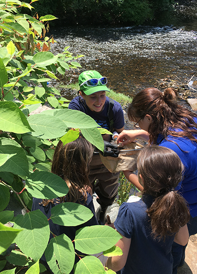 The Woonasquatucket River Watershed Council’s ‘Fish in the Classroom’ program also brings students to nature.