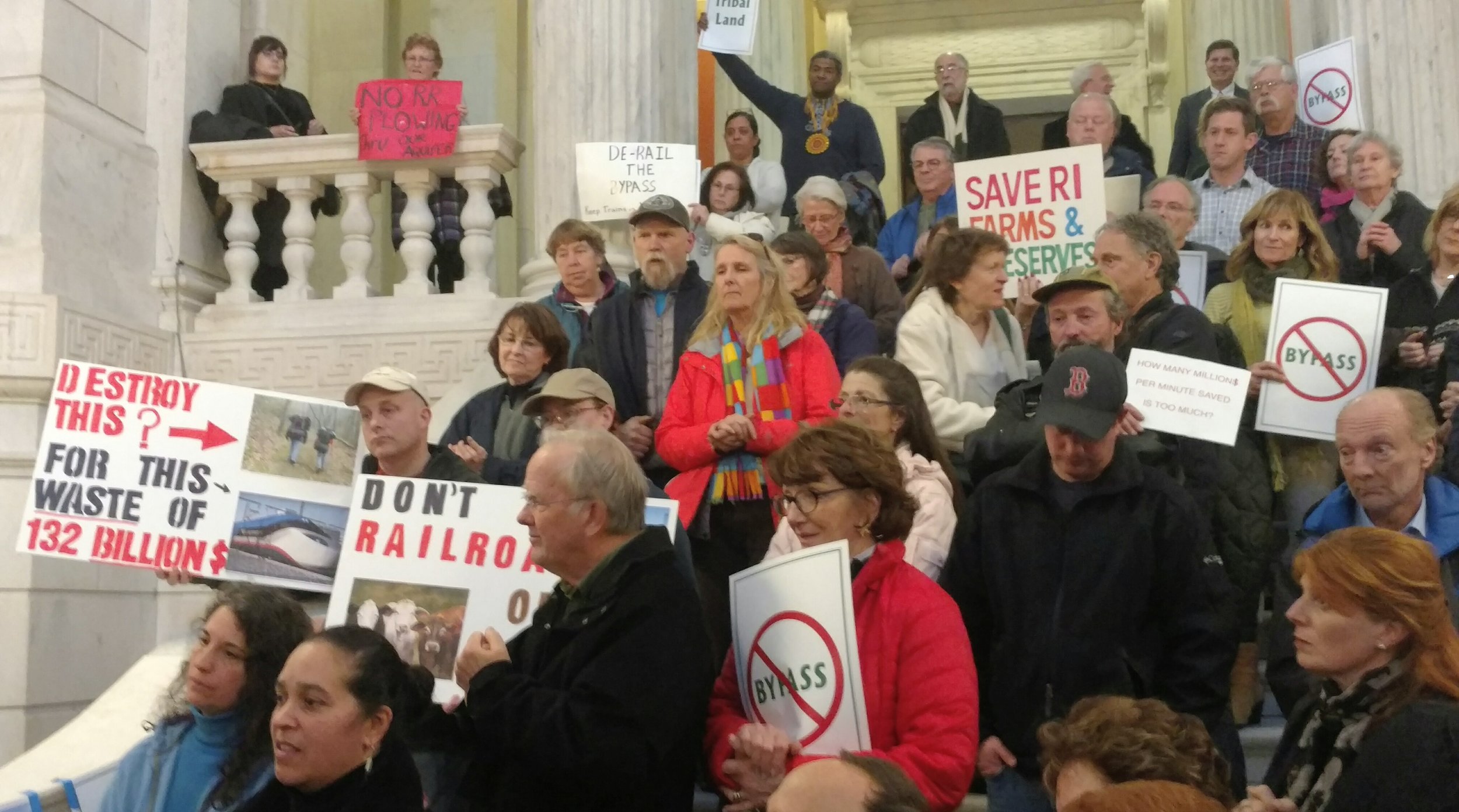 Some 200 opponents of a Washington County rail project recently rallied at the Statehouse. (Tim Faulkner/ecoRI News)