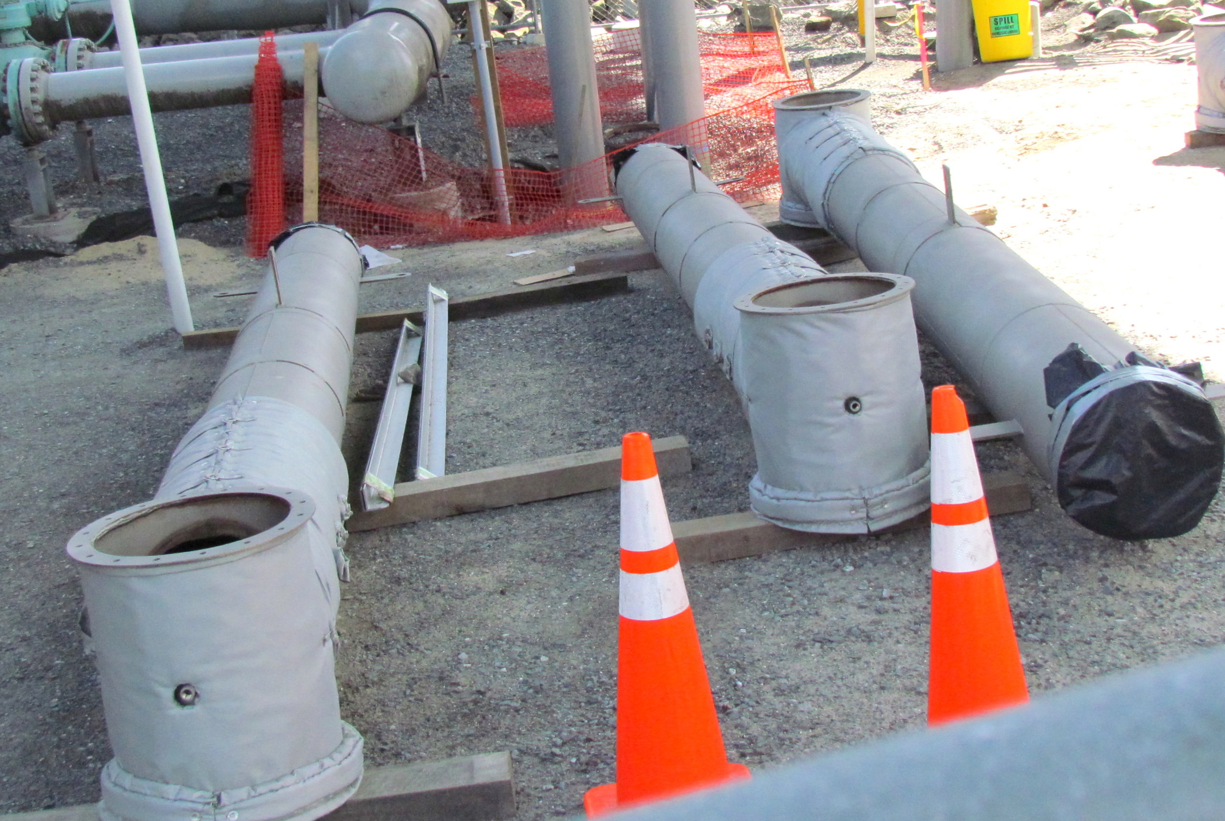 Natural-gas pipes, like these at the site of the March 29 leak in Providence, ruptured, releasing millions of cubic feet of natural gas. (Tim Faulkner/ecoRI News photos)