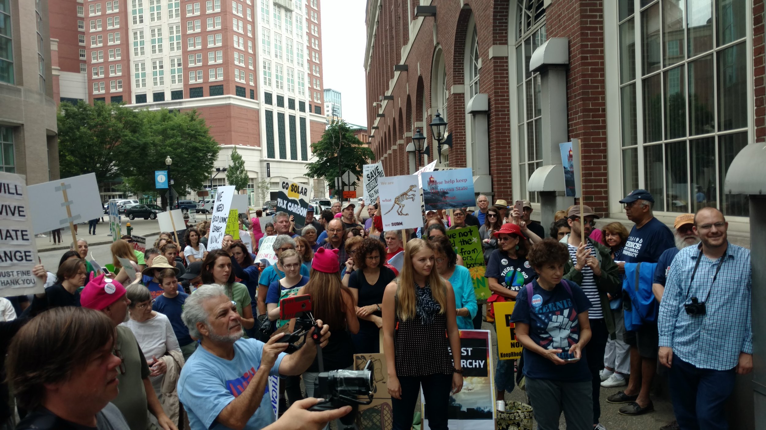 Climate activists protested outside the Rhode Island Convention Center during the National Governors Association meeting.